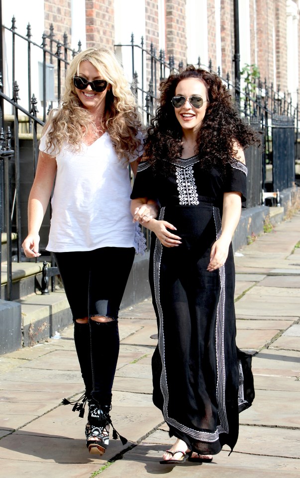  The pair looked happy and relaxed as they walked along the street