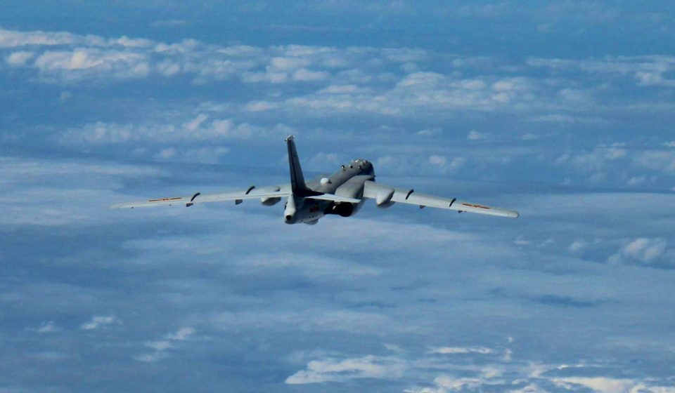  Disputed South China Sea islands, here being patrolled by a Chinese plane, form part of its plan to remain a key power in the important shipping route