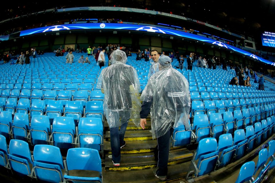  Fans fled from the Etihad after officials called off the game at around 7pm on Tuesday