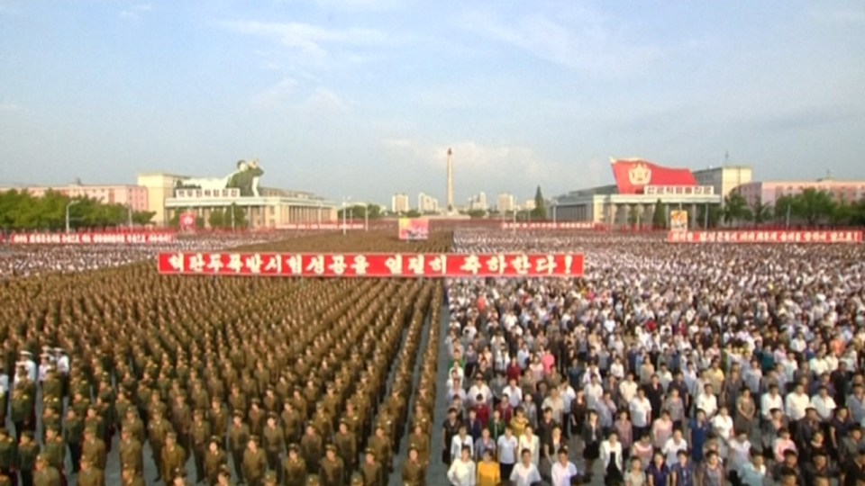  Masses of people gather in Pyongyang to take part in the demonstration