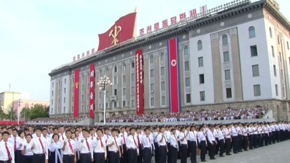  Buildings in the square were also decorated with Kim Jong-un's party flag