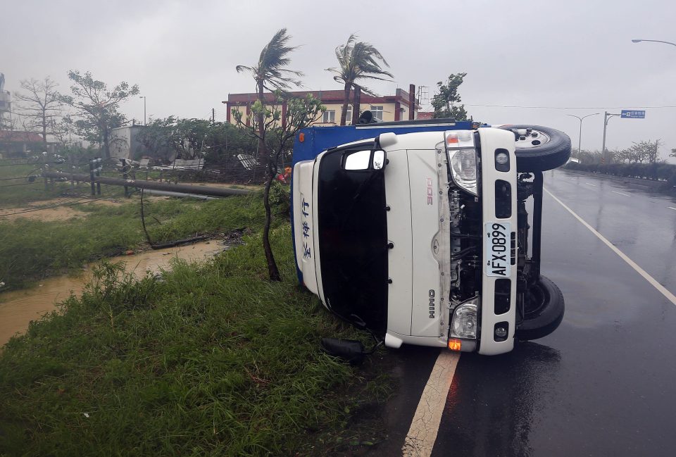  A truck is blown down by strong winds as Typhoon Meranti hits Taiwan