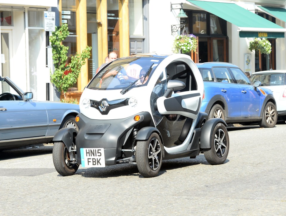  The couple drove to London lunch in the two-seat motor