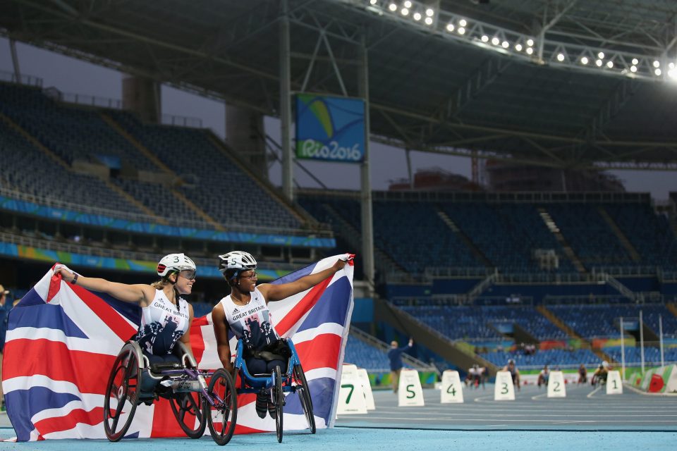  Hannah Cockroft and Kare Adenegan celebrate gold and bronze before an empty stadium