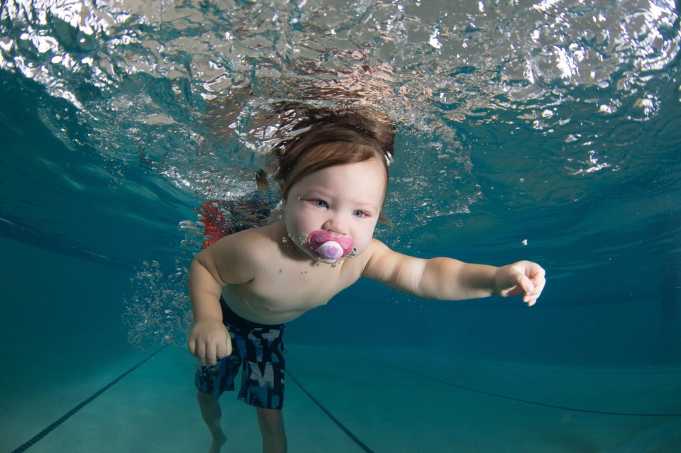  A youngster is thrown into water and left to float unaided