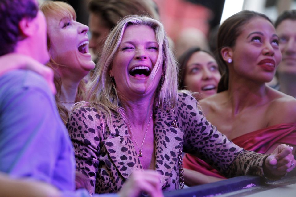  The supermodel laughed out loud as she enjoyed the gig which was part of the launch party