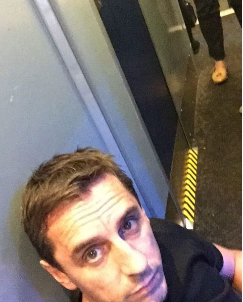  Gary Neville has posted a picture of him sitting on the floor of a train 'after giving up his seat'