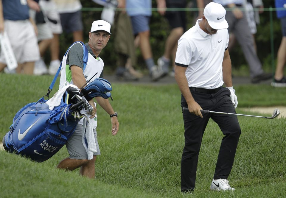  Ricky Elliott walks with US Ryder Cup golfer Brooks Koepka