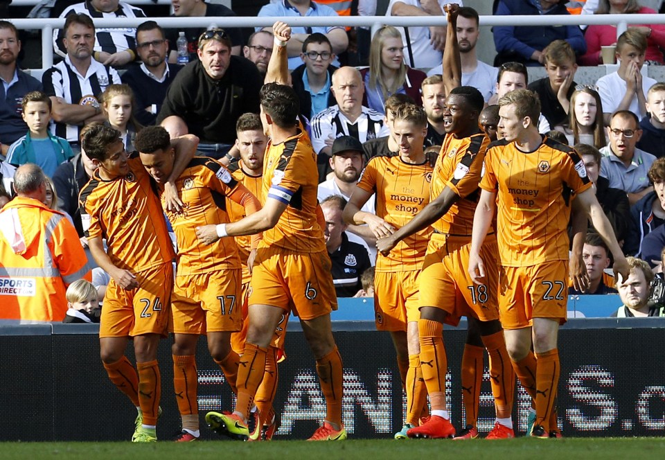  Helder Costa celebrates after scoring his side's second goal