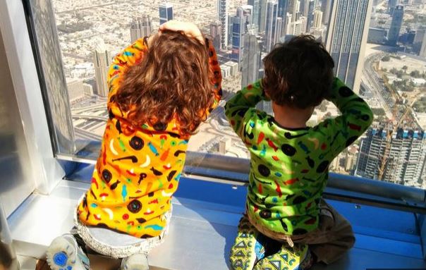  The boys look out of the window in Dubai