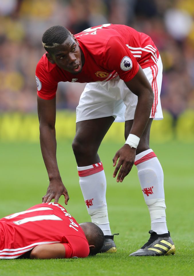  Paul Pogba rushed to check on the state of Anthony Martial after he went down