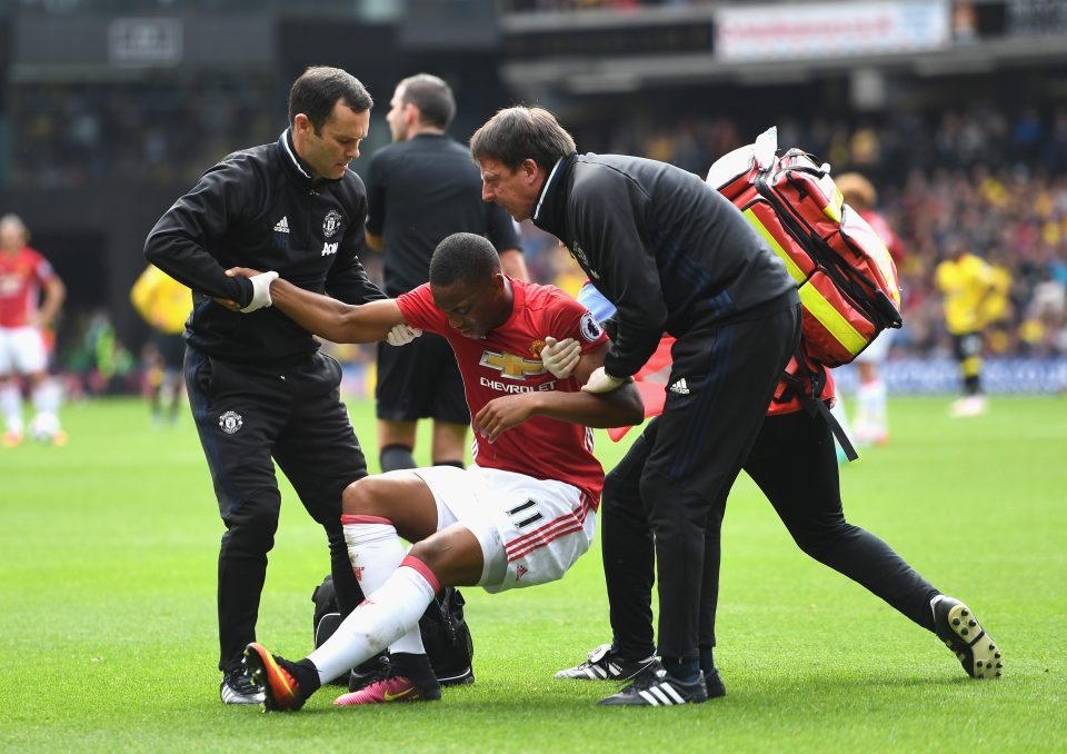  Anthony Martial had to be helped to his feet by medics after his clash