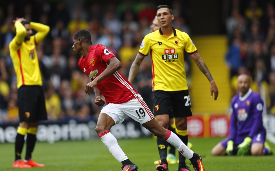  Marcus Rashford wheels away after netting the equaliser for Man United