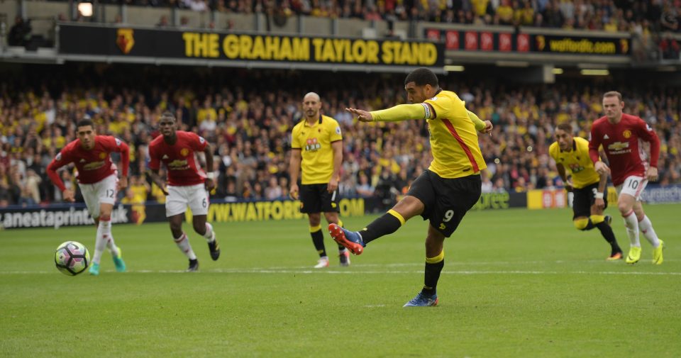  Troy Deeney smashes home the third against Manchester United