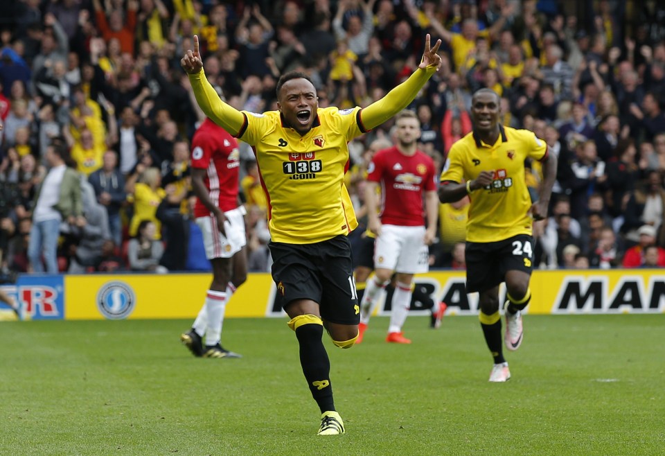  Juan Zuniga celebrates the strike that put Watford on course late on for their win