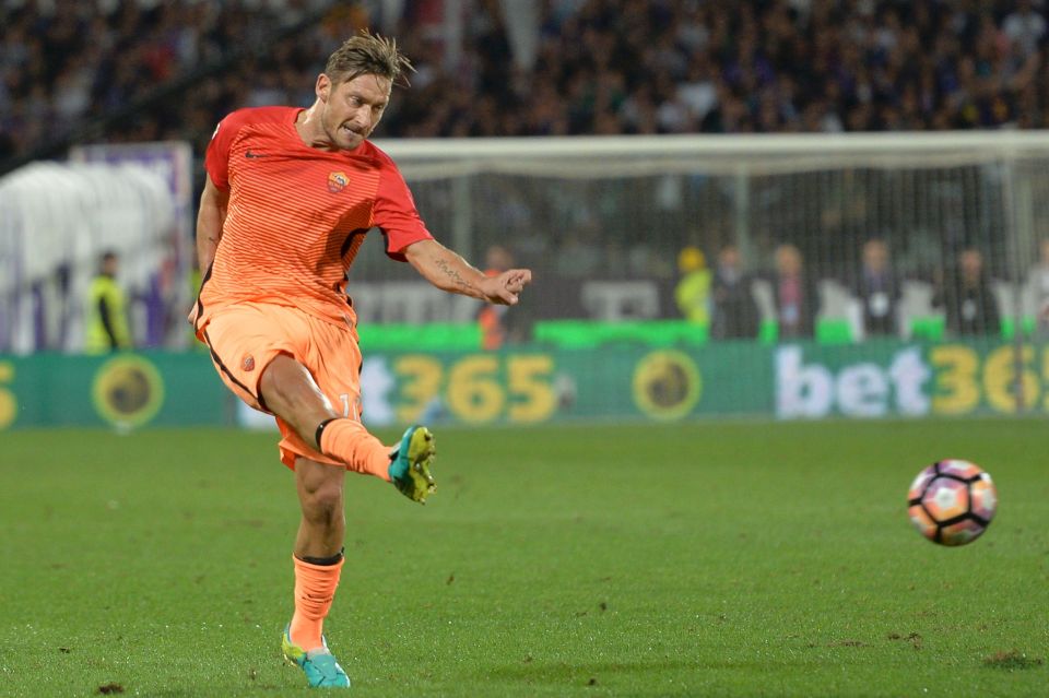  Francesco Totti goes close for Roma with late strike from outside the box