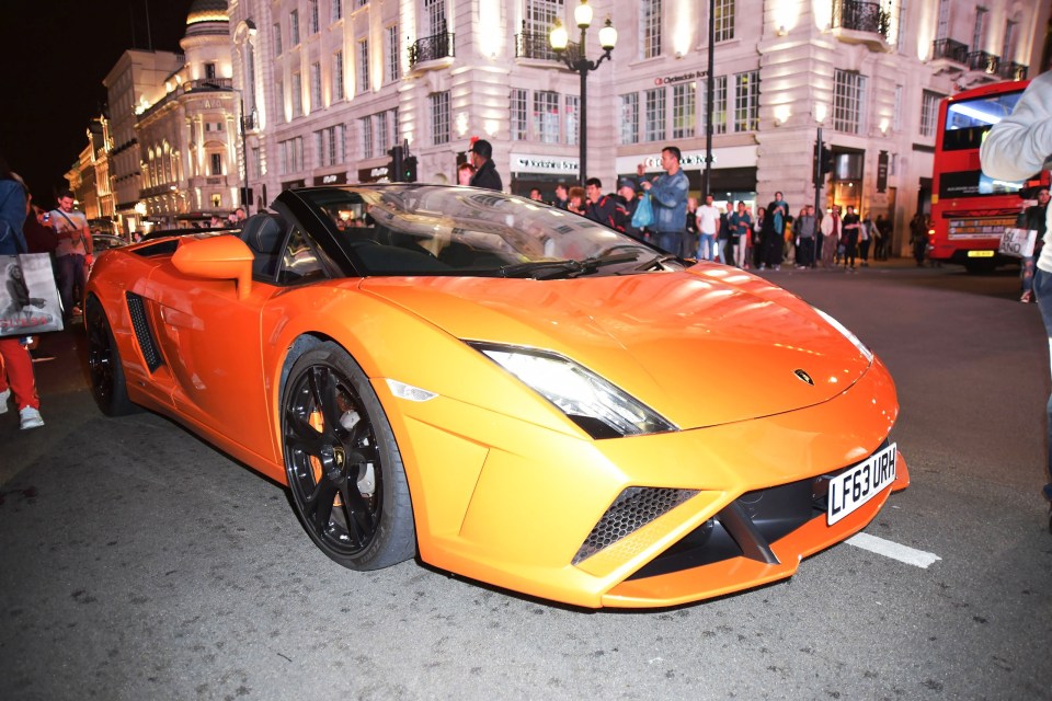  Arab supercar owners battle to outdo each other with their garish colour schemes on their cars - with this orange Lamborghini Gallardo no exception