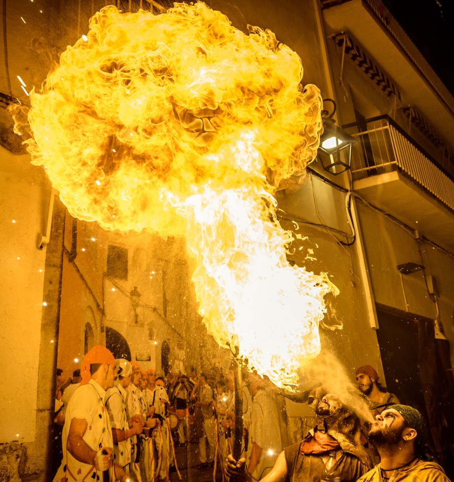  A huge blast of flame is ignited by a performer