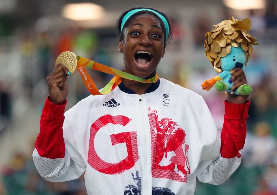  Kadeena Cox celebrates with her gold from the C4-5 500m time trial final