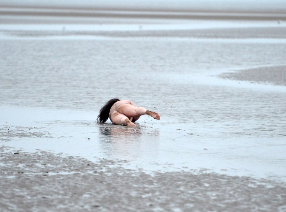  Lisa stripped naked and went for a roll in the mud after a day out at Blackpool beach