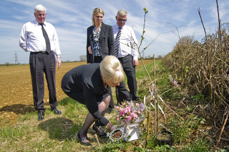  Karen and her family pay respect to Becky at the field where her body was found