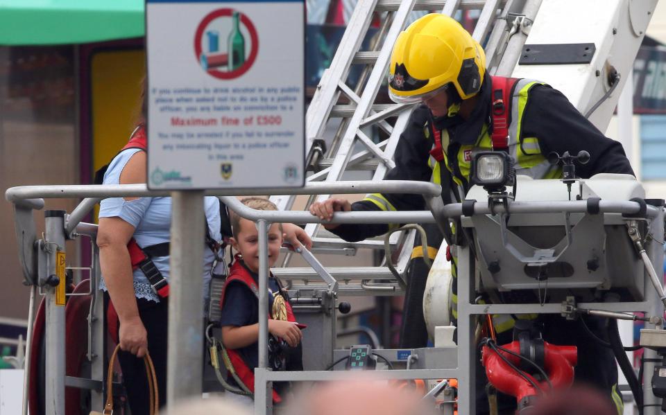  Fire services used an aerial ladder platform to rescue the pair on Monday morning