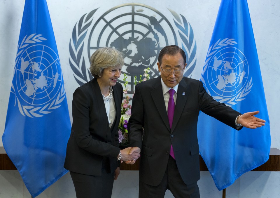  Theresa May is greeted by United Nations Secretary-General Ban Ki-moon at the United Nations headquarters