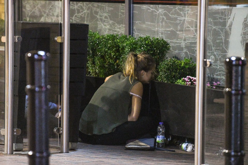  This girl was spotted with her head resting against a plant pot