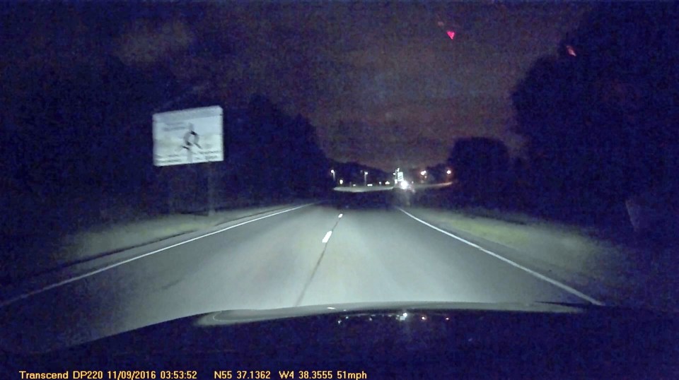  The quick-thinking driver swerves to the other side of the road, narrowly missing the pedestrian