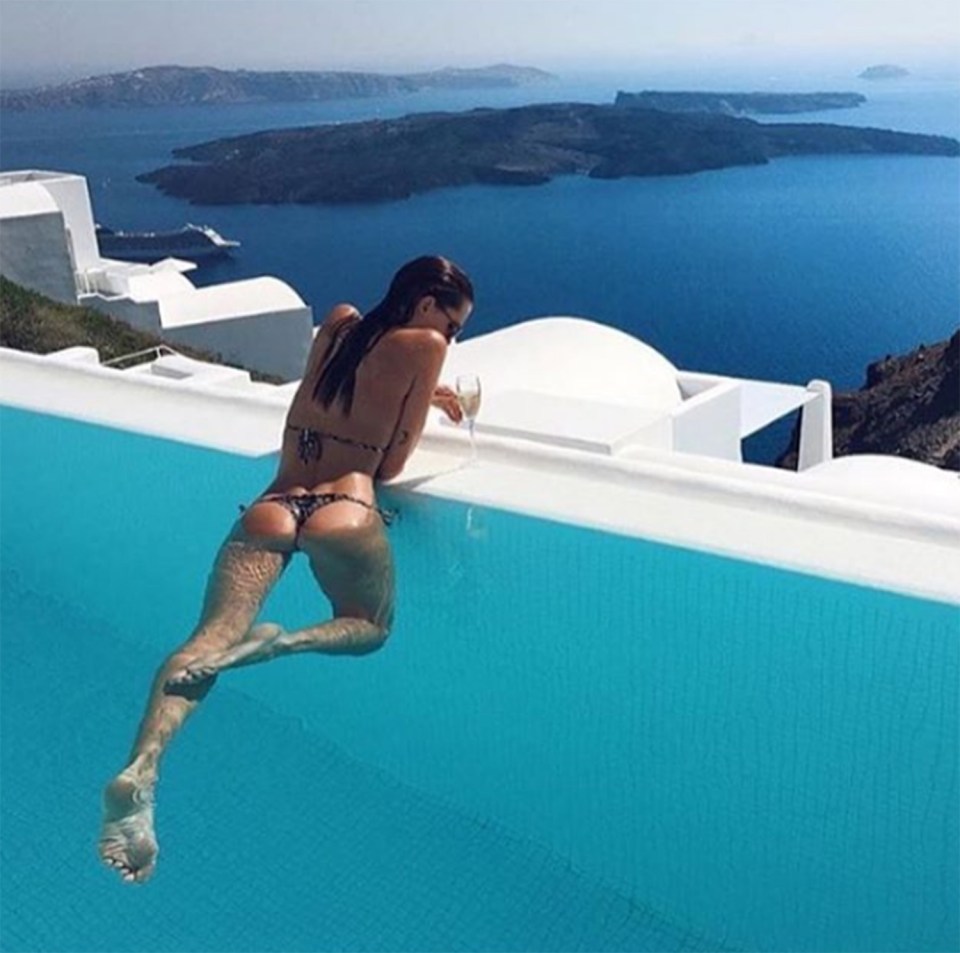  A model incites envy with her exotic holiday snap