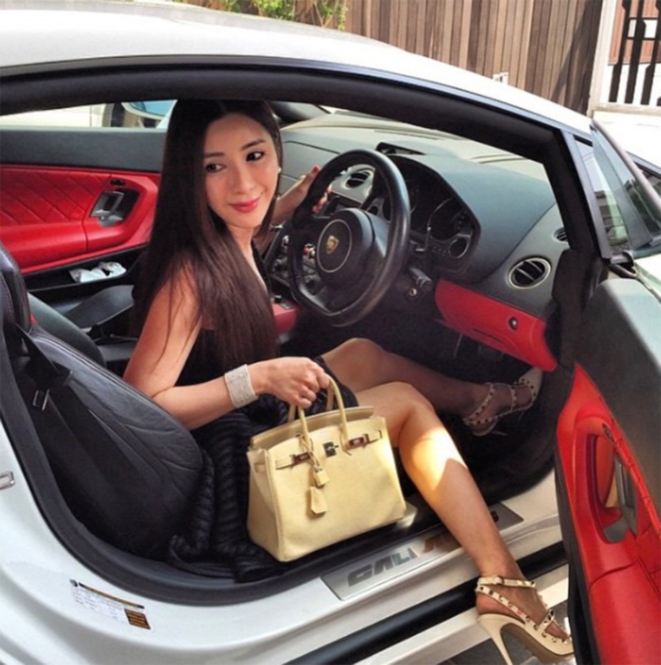  A stunner gets out of her swanky car