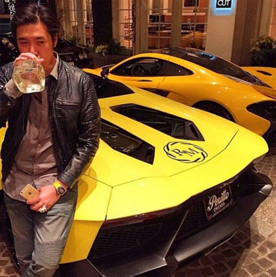  A guy sips Patron while leaning on his collection of yellow motors