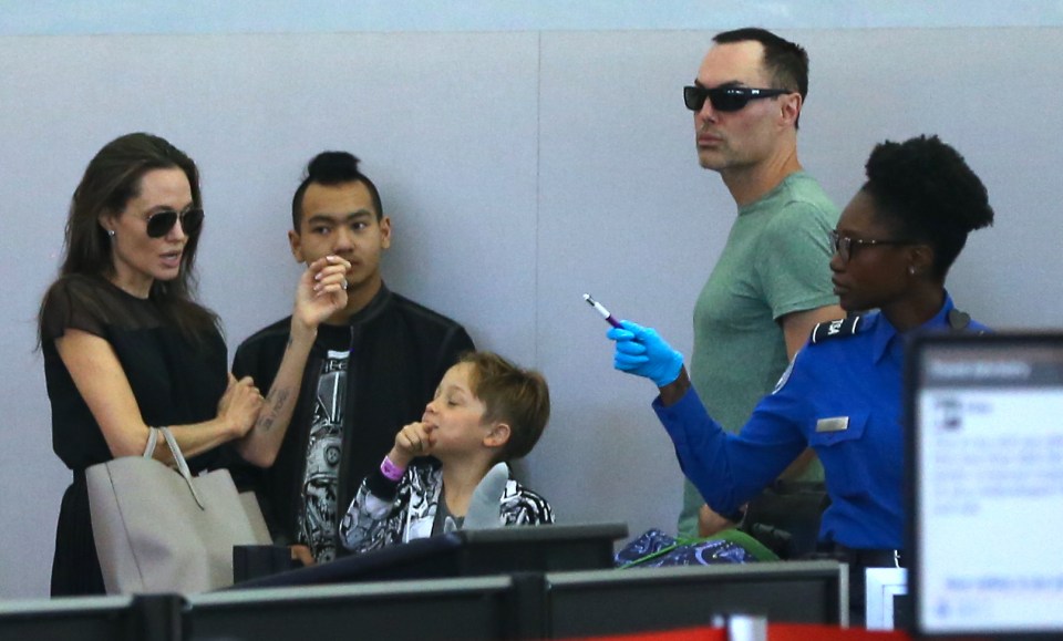  Angelina Jolie spotted in June at LAX airport with two of her children