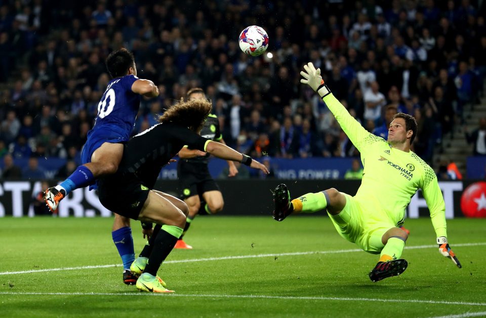  Okazaki loops a header over Asmir Begovic for the first of his two Leicester goals