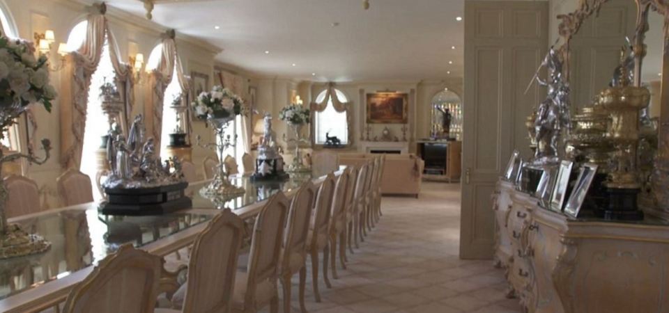  The dining room holds 24 people and is where David keeps his horse racing trophies