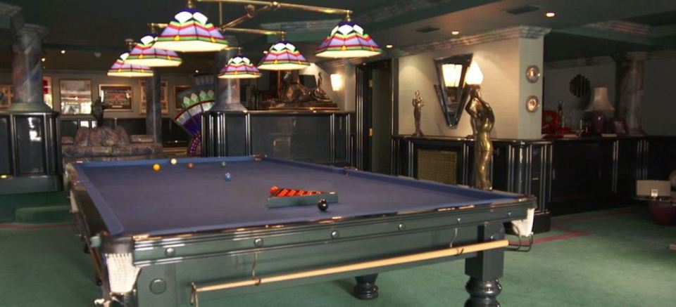  This beautiful games room holds a snooker table