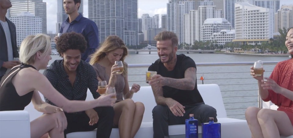  The star is seen drinking amongst pals in the video