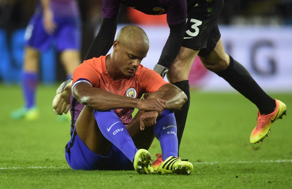  Vincent Kompany's injury curse may have struck again after limping off at Swansea