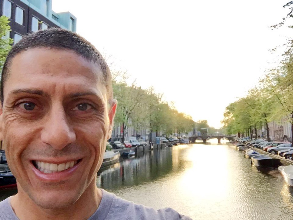  CJ de Mooi pictured by a canal in Amsterdam