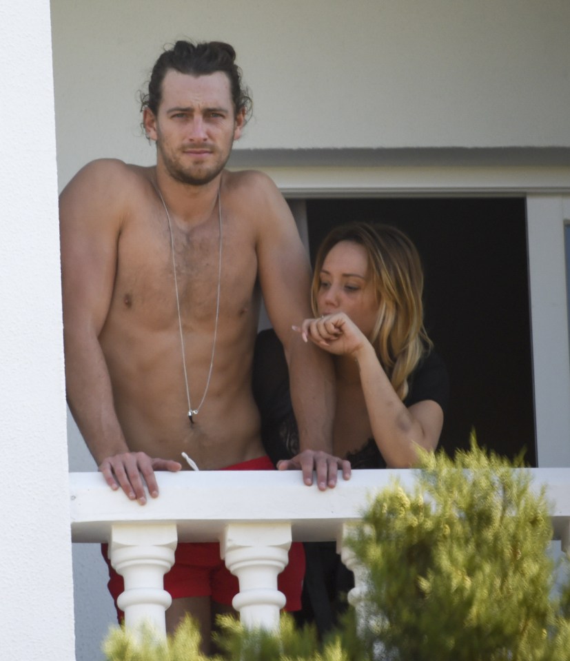 The couple enjoyed the view from their hotel room together