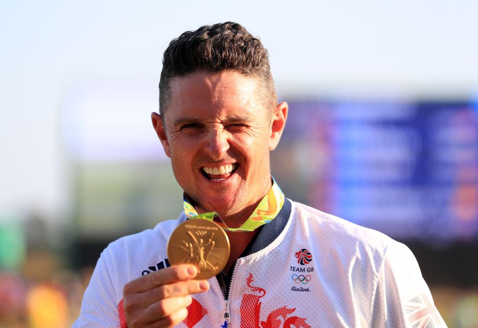 Rose with his Olympic gold medal