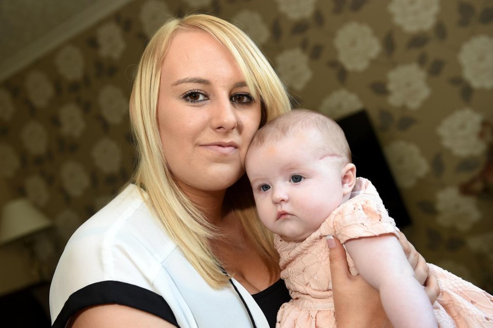  Emma Edwards' daughter Karmen has been left with a one-and-a-half-inch scar as a result of a surgical blunder