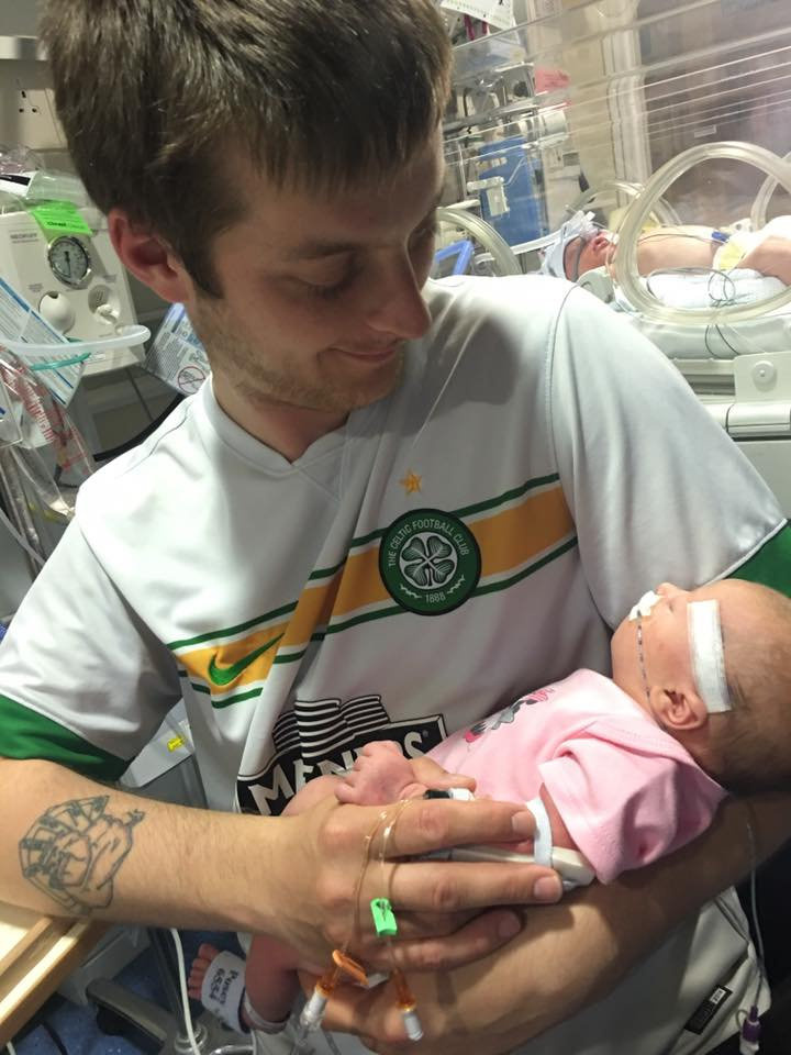  Dad, George McPhee, with his daughter in the hospital when she was born