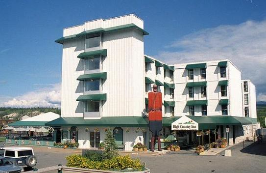 A giant wooden mountie sits outside the Coast High Country Inn, which was chosen as a place for the royal couple to stay while on their trip around Canada