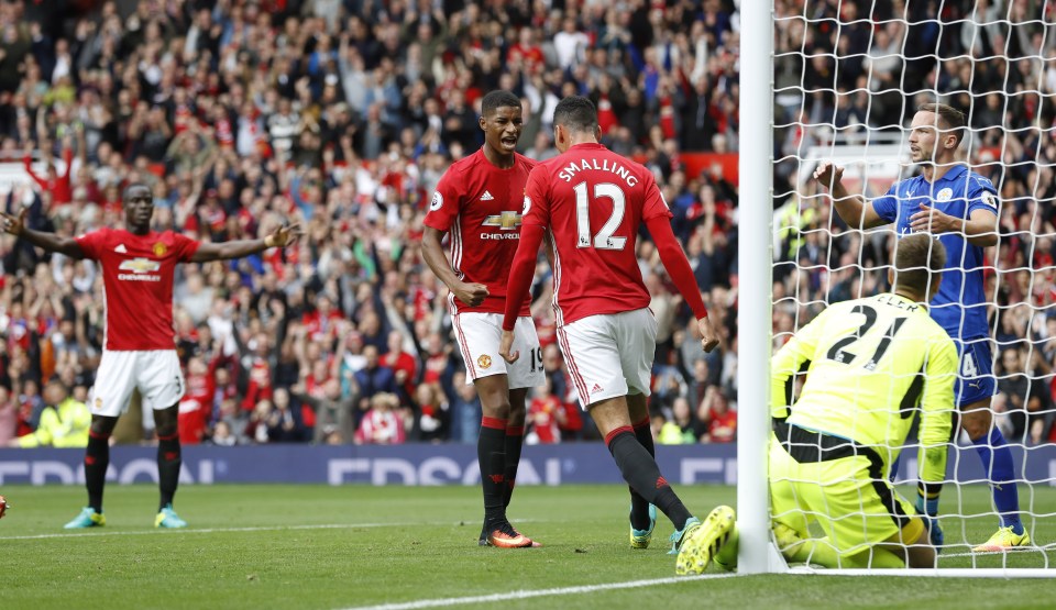  Chris Smalling celebrates after giving Manchester United lead against Leicester