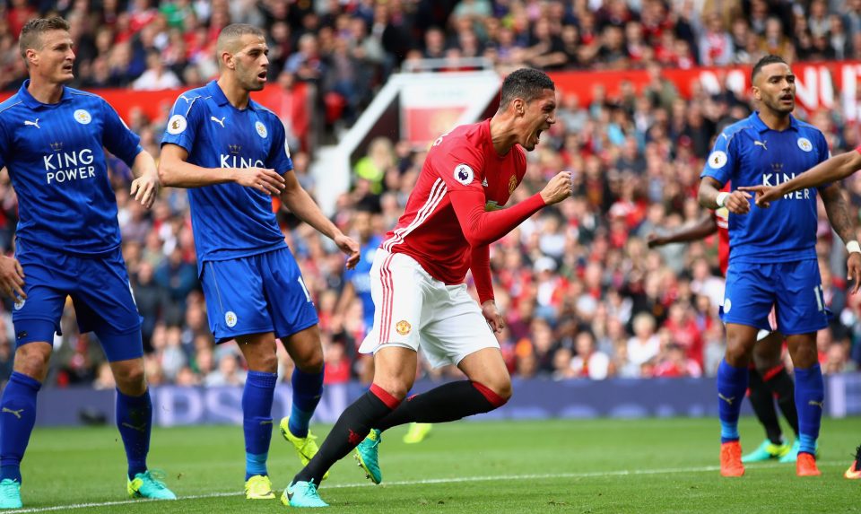  Chris Smalling reels away in celebration after scoring the opener at Old Trafford