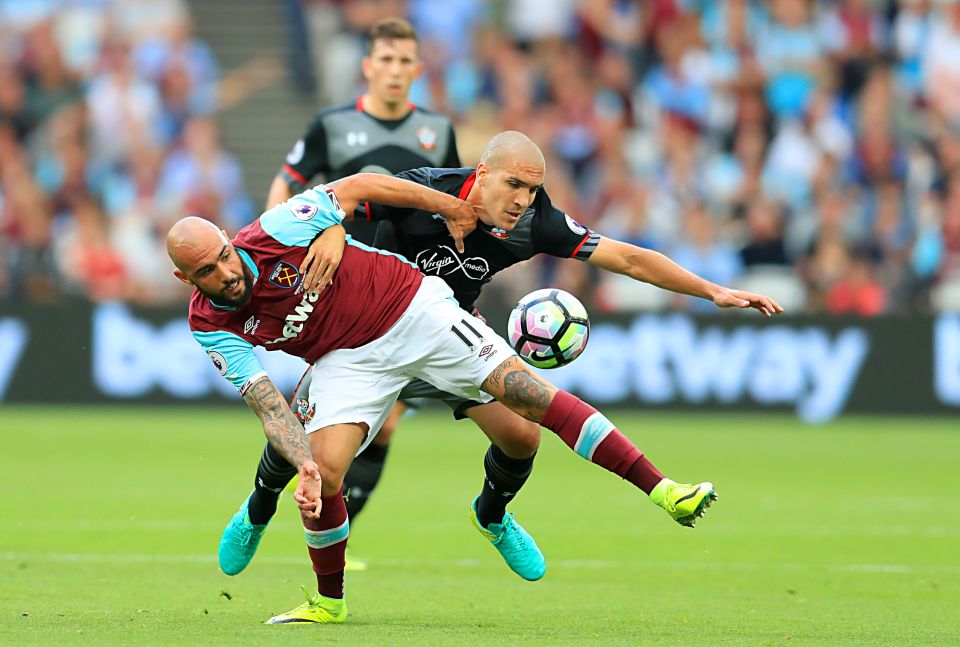  Simone Zaza and Oriol Romeu tangle as things get heated on the pitch