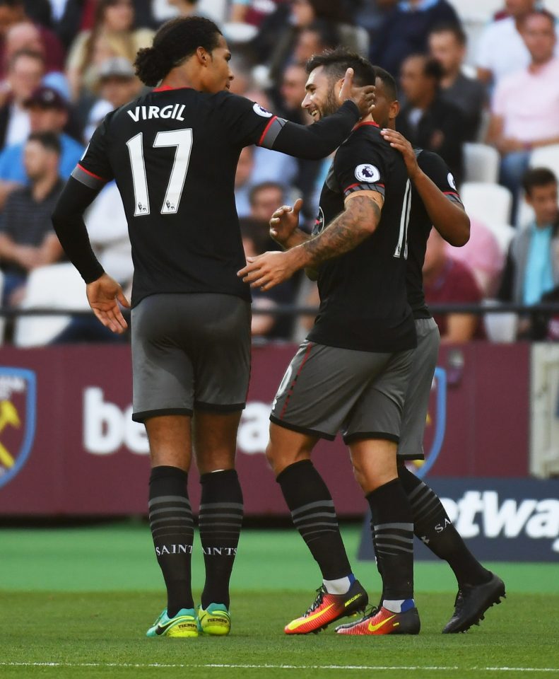  Southampton stars celebrate as Charlie Austin puts the visitors ahead after 39 minutes