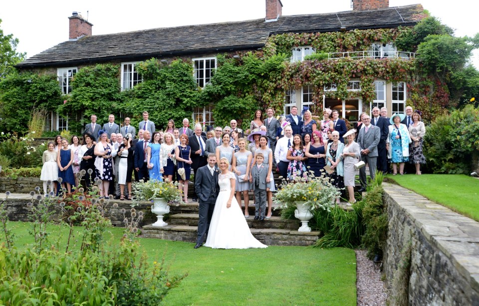  Pictured with friends and family outside the wedding venue