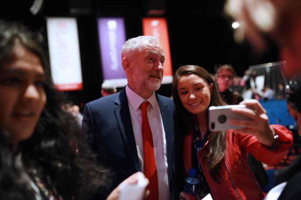  He even posed with fans as the conference drew to a close